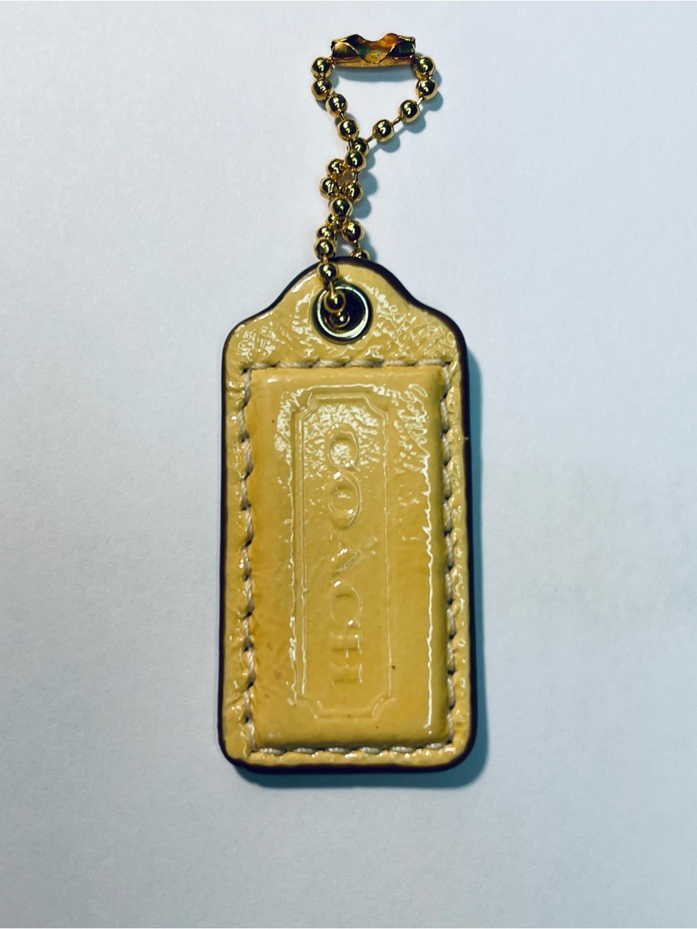 Coach Patent Leather Hang Tag in Yellow with Gold Ball Chain 2”